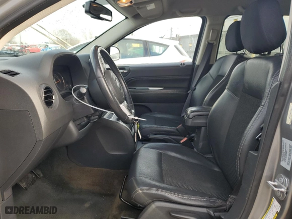 2016 Jeep Compass Latitude with VIN 1C4NJDEB8GD757624, listed as a Copart auction lot 84997714 with 140,906 mi miles and Salvage Title. Bid and sale history available at carsss.com. Image 7.