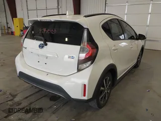 2018 Toyota Prius One with VIN JTDKDTB38J1599974, listed as a IAAI auction lot 41977533 with 71,225 mi miles and . Bid and sale history available at DreamBid. Image 4.