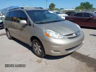 2010 Toyota Sienna XLE with VIN 5TDYK4CC5AS292110, listed as a IAAI auction lot 42055505 with 107,390 mi miles. Bid and sale history available at carsss.com. Image 1.