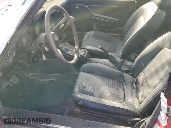 1984 Alfa Romeo Spider Veloce z VIN ZARBA5414E1020264, wystawiony jako Copart lot #75438954 z przebiegiem Nie podano mil oraz Nie do naprawy • Non repairable. Historia ofert i sprzedaży dostępna na DreamBid. Obrazek 7.