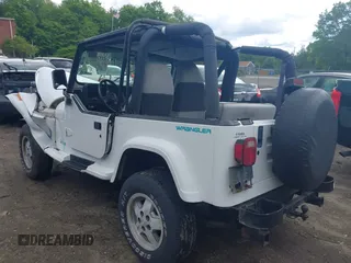 1995 Jeep Wrangler z VIN 1J4FY29S1SP206760, wystawiony jako IAAI lot #42326399 z przebiegiem 55 278 mil mil oraz . Historia ofert i sprzedaży dostępna na DreamBid. Obrazek 3.