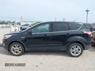 2017 Ford Escape SE with VIN 1FMCU0GD3HUC91104, listed as a IAAI auction lot 42142522 with 107,147 mi miles. Bid and sale history available at carsss.com. Image 14.