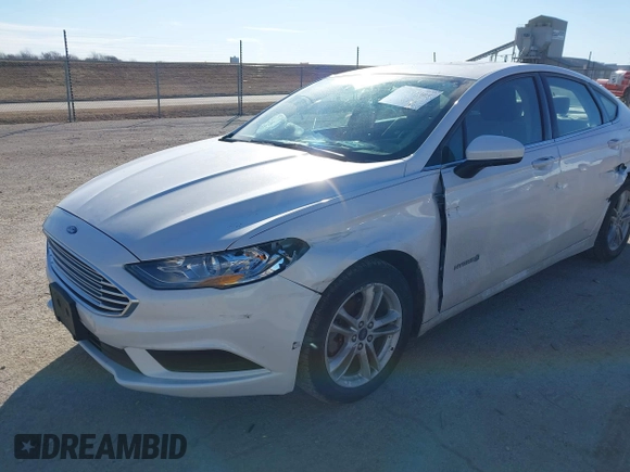 2018 Ford Fusion Hybrid SE with VIN 3FA6P0LU4JR152682, listed as a IAAI auction lot 41691305 with 142,059 mi miles. Bid and sale history available at carsss.com. Image 6.