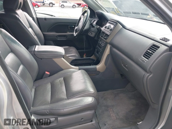 2006 Honda Pilot EX-L with VIN 2HKYF186X6H554433, listed as a IAAI auction lot 42111274 with 212,610 mi miles and . Bid and sale history available at DreamBid. Image 5.