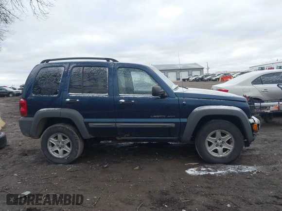 2002 Jeep Liberty Sport with VIN 1J8GL48K32W132617, listed as a IAAI auction lot 41732799 with 202,894 mi miles. Bid and sale history available at carsss.com. Image 14.