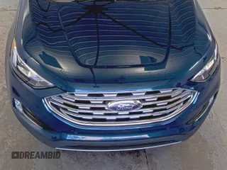 2020 Ford Edge Titanium z VIN 2FMPK3K91LBB37761, wystawiony jako IAAI lot #42829390 z przebiegiem 90 117 mil mil oraz . Historia ofert i sprzedaży dostępna na DreamBid. Obrazek 16.