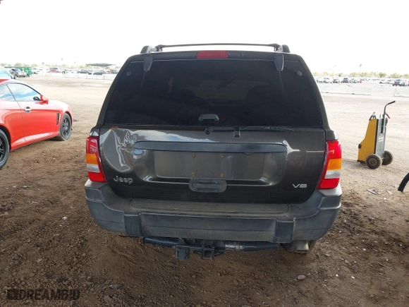 2004 Jeep Grand Cherokee Laredo with VIN 1J4GX48N64C436853, listed as a IAAI auction lot 41785918 with 118,578 mi miles. Bid and sale history available at carsss.com. Image 15.