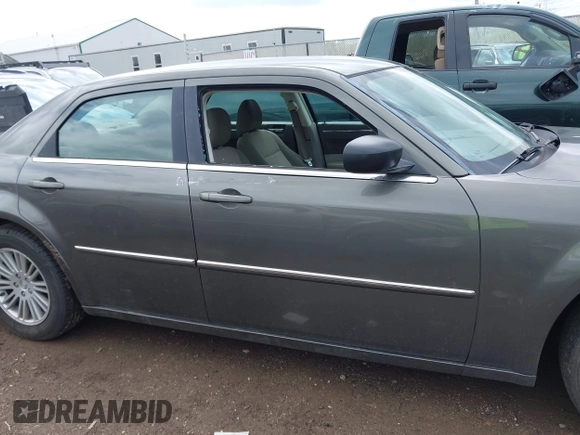 2009 Chrysler 300 LX with VIN 2C3KA43D49H558006, listed as a IAAI auction lot 42178195 with 208,864 mi miles and . Bid and sale history available at DreamBid. Image 14.