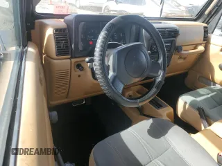 1997 Jeep Wrangler Sahara with VIN 1J4FY49S2VP495910, listed as a Copart auction lot 47794585 with 147,420 mi miles and Salvage Title. Bid and sale history available at carsss.com. Image 8.
