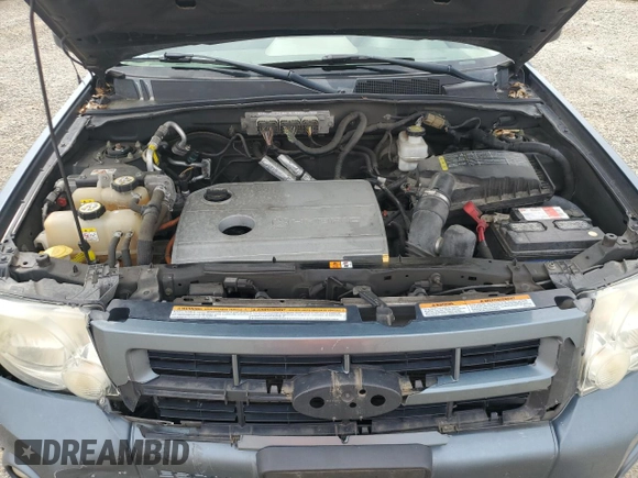 2010 Ford Escape Hybrid z VIN 1FMCU4K35AKB31202, wystawiony jako Copart lot #52922525 z przebiegiem 152 303 mil mil oraz Szkoda całkowita • Salvage title. Historia ofert i sprzedaży dostępna na DreamBid. Obrazek 13.
