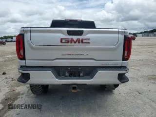 2020 GMC Sierra 2500HD Denali z VIN 1GT49REY7LF319360, wystawiony jako Copart lot #59770565 z przebiegiem 69 509 mil mil oraz Nie do naprawy • Non repairable. Historia ofert i sprzedaży dostępna na DreamBid. Obrazek 6.