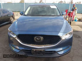 2021 Mazda CX-5 Touring with VIN JM3KFACM5M0332718, listed as a IAAI auction lot 41905933 with 30,930 mi miles. Bid and sale history available at carsss.com. Image 13.