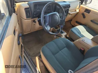 1997 Jeep Wrangler Sahara with VIN 1J4FY49S3VP519387, listed as a Copart auction lot 63822395 with 187,884 mi miles and Salvage title. Bid and sale history available at DreamBid. Image 8.