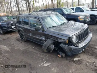 2015 Jeep Patriot Altitude Edition with VIN 1C4NJPBA5FD400428, listed as a IAAI auction lot 41814600 with 150,524 mi miles. Bid and sale history available at carsss.com. Image 1.