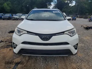 2018 Toyota RAV4 XLE with VIN JTMWFREV0JJ204150, listed as a Copart auction lot 59610825 with 34,730 mi miles and Salvage title. Bid and sale history available at DreamBid. Image 5.