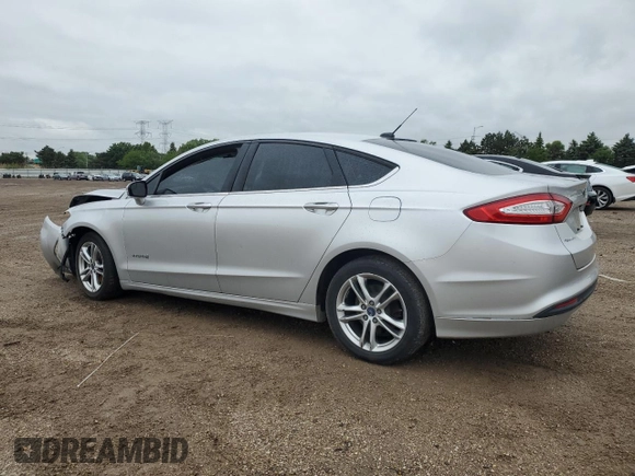 2013 Ford Fusion SE Hybrid с VIN 3FA6P0LU9DR233472, выставлен на аукционе Copart как лот 57994345 с пробегом 194 862 миль миль и Списание • Salvage title. История ставок и продаж доступна на DreamBid. Изображение 2.