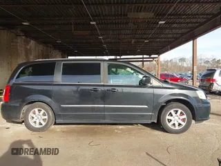 2012 Chrysler Town & Country Touring z VIN 2C4RC1BG2CR159420, wystawiony jako IAAI lot #41035284 z przebiegiem 142 529 mil mil oraz . Historia ofert i sprzedaży dostępna na DreamBid. Obrazek 14.