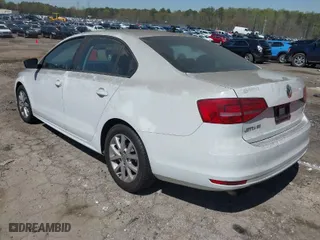 2015 Volkswagen Jetta Sedan 1.8T Sport with VIN 3VWD17AJ9FM321682, listed as a IAAI auction lot 41889188 with 135,238 mi miles. Bid and sale history available at carsss.com. Image 3.