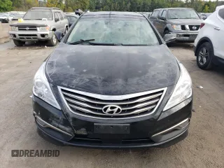2017 Hyundai Azera Limited с VIN KMHFH4JG1HA579216, выставлен на аукционе Copart как лот 71684114 с пробегом 197 091 миль миль и На запчасти • Non repairable. История ставок и продаж доступна на DreamBid. Изображение 5.