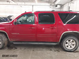 2013 GMC Yukon XL SLT with VIN 1GKS2KE75DR333420, listed as a IAAI auction lot 41712106 with 234,473 mi miles. Bid and sale history available at carsss.com. Image 14.
