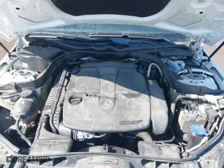 2015 Mercedes-Benz E-Class E 350 Luxury with VIN WDDHF8JB7FB090296, listed as a IAAI auction lot 41728470 with 104,738 mi miles. Bid and sale history available at carsss.com. Image 10.