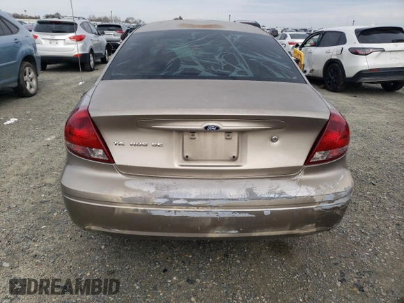 2004 Ford Taurus SE with VIN 1FAFP53U34G129631, listed as a Copart auction lot 45054375 with 182,089 mi miles and Salvage title. Bid and sale history available at DreamBid. Image 6.