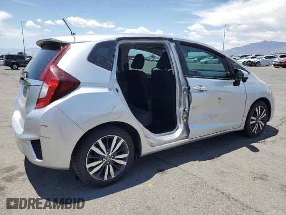 2016 Honda Fit EX with VIN JHMGK5H79GX020531, listed as a Copart auction lot 60224965 with 98,295 mi miles and Salvage title. Bid and sale history available at DreamBid. Image 3.