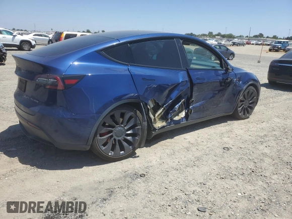 2022 Tesla Model Y Performance z VIN 7SAYGDEF6NF337710, wystawiony jako Copart lot #60200985 z przebiegiem 101 168 mil mil oraz Szkoda całkowita • Salvage title. Historia ofert i sprzedaży dostępna na DreamBid. Obrazek 3.