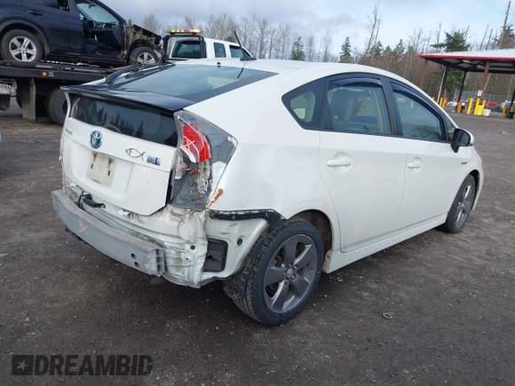 2015 Toyota Prius Four with VIN JTDKN3DU9F0419871, listed as a IAAI auction lot 41598677 with 122,978 mi miles. Bid and sale history available at carsss.com. Image 4.
