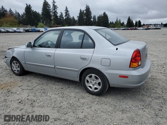 2005 Hyundai Accent GLS z VIN KMHCG45C75U639281, wystawiony jako Copart lot #54887095 z przebiegiem 136 090 mil mil oraz Szkoda całkowita • Salvage title. Historia ofert i sprzedaży dostępna na DreamBid. Obrazek 2.