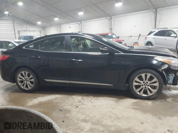 2013 Hyundai Azera z VIN KMHFG4JG4DA218608, wystawiony jako IAAI lot #41601792 z przebiegiem 101 846 mil mil oraz . Historia ofert i sprzedaży dostępna na DreamBid. Obrazek 13.