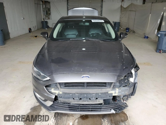 2017 Ford Fusion SE with VIN 3FA6P0HDXHR213441, listed as a Copart auction lot 53442915 with 128,624 mi miles and Salvage title. Bid and sale history available at DreamBid. Image 5.