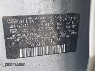 2014 Hyundai Elantra GT with VIN KMHD35LH8EU216052, listed as a IAAI auction lot 42102173 with 112,129 mi miles. Bid and sale history available at carsss.com. Image 9.