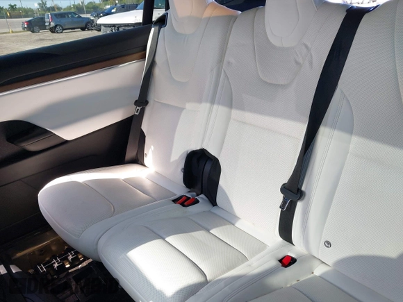 2022 Tesla Model X with VIN 7SAXCDE54NF342256, listed as a IAAI auction lot 41991212 with 28,740 mi miles and . Bid and sale history available at DreamBid. Image 8.