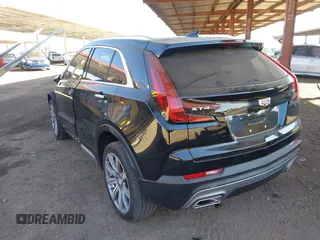 2023 Cadillac XT4 FWD Premium Luxury with VIN 1GYFZCR49PF173489, listed as a IAAI auction lot 41332451 with 10,227 mi miles and . Bid and sale history available at DreamBid. Image 3.