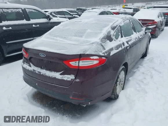 2013 Ford Fusion SE Hybrid with VIN 3FA6P0LU1DR316619, listed as a IAAI auction lot 41515812 with 136,669 mi miles and . Bid and sale history available at carsss.com. Image 4.