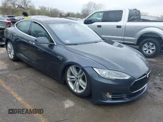 2016 Tesla Model S 90D with VIN 5YJSA1E27GF122503, listed as a IAAI auction lot 41947580 with 128,318 mi miles and . Bid and sale history available at DreamBid. Image 1.