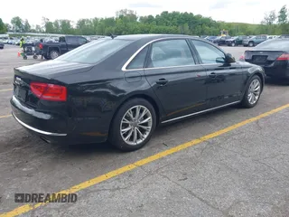 2013 Audi A8 3.0L с VIN WAURGAFD8DN012938, выставлен на аукционе IAAI как лот 42334901 с пробегом 64 235 миль миль и . История ставок и продаж доступна на DreamBid. Изображение 4.