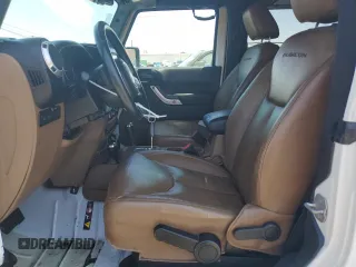 2015 Jeep Wrangler Rubicon Hard Rock z VIN 1C4BJWCG5FL561397, wystawiony jako Copart lot #61218185 z przebiegiem 164 240 mil mil oraz Czysty tytuł • Clean title. Historia ofert i sprzedaży dostępna na DreamBid. Obrazek 7.