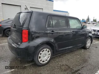 2009 Scion xB with VIN JTLKE50EX91071110, listed as a Copart auction lot 48939845 with 163,798 mi miles and Salvage Title. Bid and sale history available at DreamBid. Image 3.
