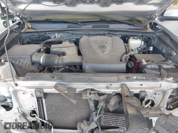 2018 Toyota Tacoma SR with VIN 3TMCZ5ANXJM146284, listed as a IAAI auction lot 42041525 with 103,143 mi miles and . Bid and sale history available at DreamBid. Image 10.