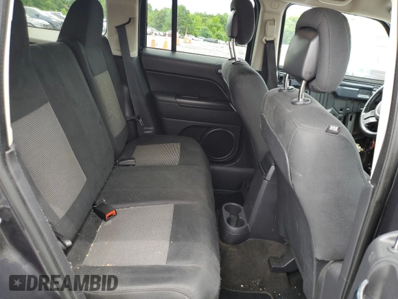 2014 Jeep Patriot Latitude with VIN 1C4NJRFB2ED718259, listed as a Copart auction lot 58095825 with 116,665 mi miles and Salvage title. Bid and sale history available at DreamBid. Image 11.