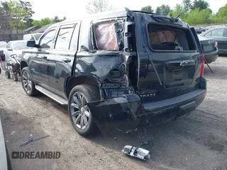 2016 Chevrolet Tahoe LT z VIN 1GNSKBKC7GR331631, wystawiony jako IAAI lot #42300624 z przebiegiem 73 126 mil mil oraz . Historia ofert i sprzedaży dostępna na DreamBid. Obrazek 3.