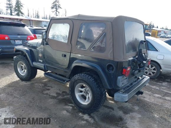1999 Jeep Wrangler Sahara with VIN 1J4FY49S9XP410760, listed as a IAAI auction lot 41647187 with 181,353 mi miles. Bid and sale history available at carsss.com. Image 3.
