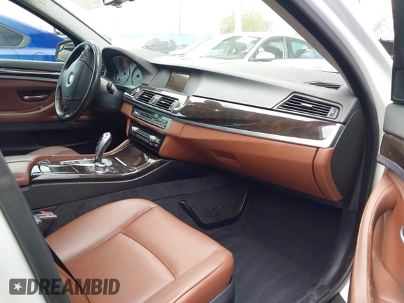 2013 BMW 5 Series 528i with VIN WBAXG5C50DDY34618, listed as a IAAI auction lot 42018050 with 85,272 mi miles and . Bid and sale history available at carsss.com. Image 5.
