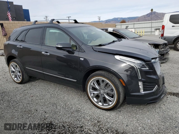 2020 Cadillac XT5 AWD Sport with VIN 1GYKNHRS7LZ122393, listed as a Copart auction lot 84266534 with 19,641 mi miles and Salvage title. Bid and sale history available at DreamBid. Image 4.