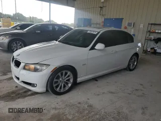 2011 BMW 3 Series 328i with VIN WBAPH7G50BNN06710, listed as a Copart auction lot 76987974 with 157,514 mi miles and Salvage Title. Bid and sale history available at carsss.com. Image 1.