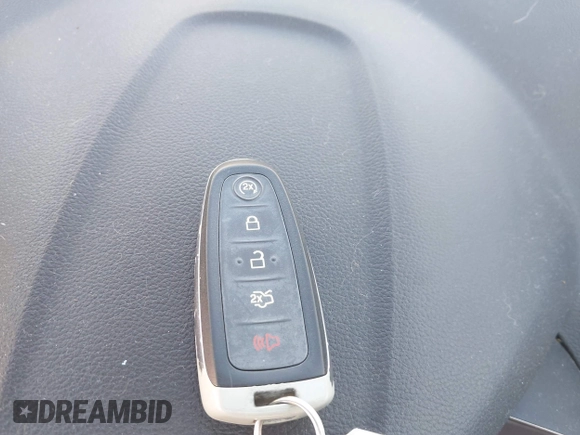 2014 Ford Escape Titanium with VIN 1FMCU0J91EUE12034, listed as a IAAI auction lot 42027493 with 160,417 mi miles and . Bid and sale history available at DreamBid. Image 11.
