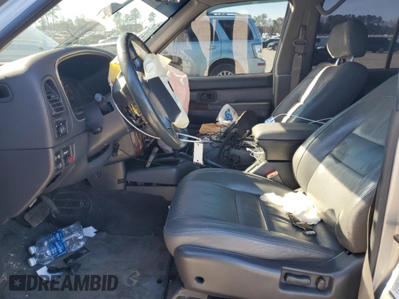 2000 Infiniti QX4 with VIN JNRAR07Y1YW077992, listed as a Copart auction lot 45572015 with 202,385 mi miles and Salvage Title. Bid and sale history available at DreamBid. Image 7.