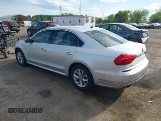 2016 Volkswagen Passat S with VIN 1VWAT7A39GC014305, listed as a IAAI auction lot 42144322 with 187,419 mi miles and . Bid and sale history available at DreamBid. Image 3.